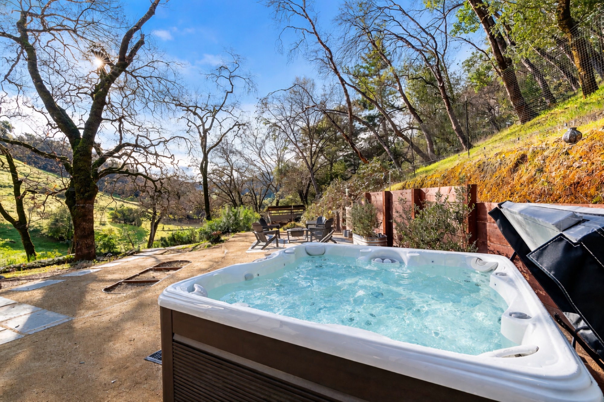 Hot tub nestled under the trees